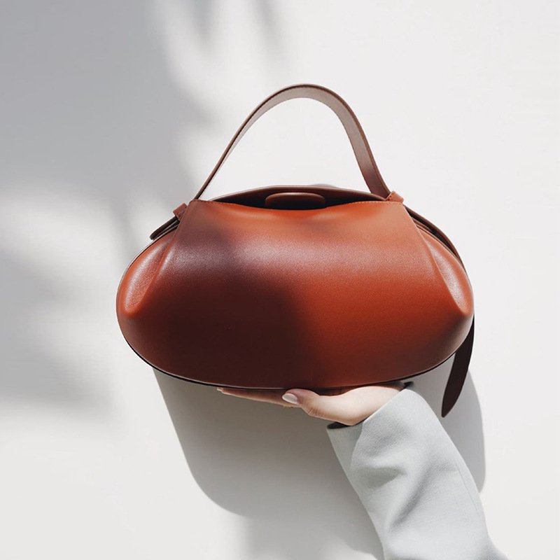 Le sac populaire de cette année 2025 sac à bandoulière décontracté et polyvalent tridimensionnel dames aisselle petit sac rond sac baguette sac à main
