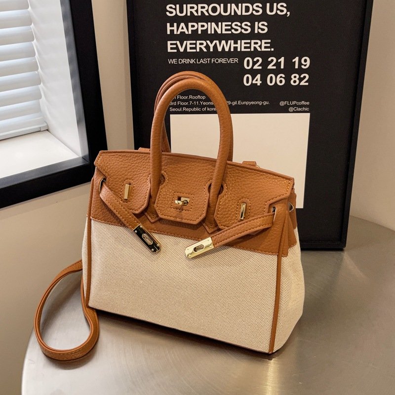ins Internet célébrité femme sac à bandoulière 2024 nouvelle tendance sac en toile mode européenne et américaine motif galet contraste sac platine
