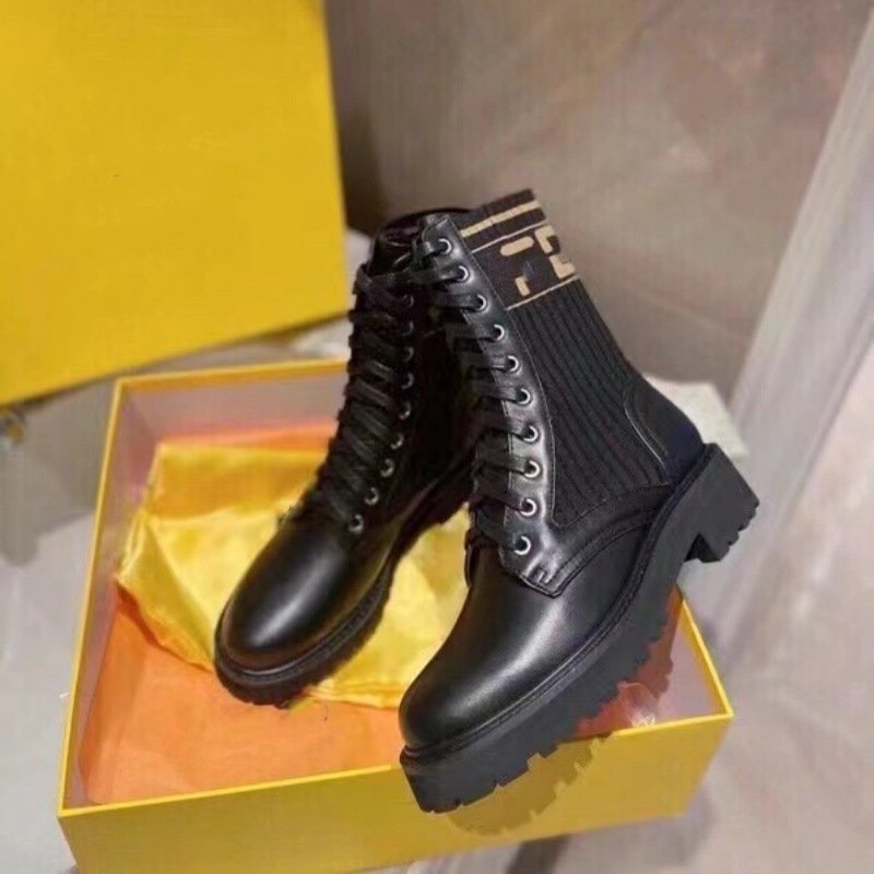 L’Europe, l’Amérique, le Moyen-Orient, Dubaï, Singapour, la Malaisie, la Russie, coutures en cuir classiques, bottes Martin à lacets à tissage de mouches